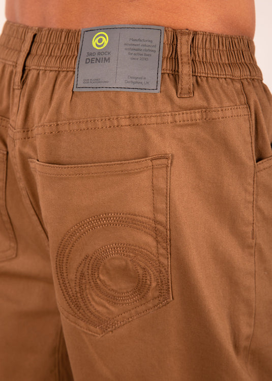 3rd Rock gaia Twill in Camels Arse worn by model facing away, close up of embroided design on back pocket
