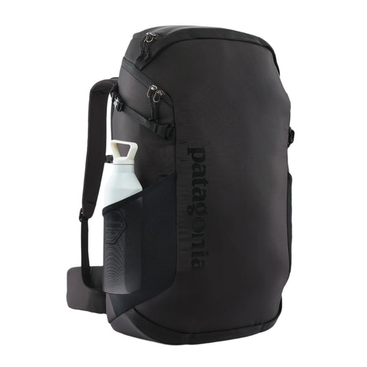 Black Diamond Cragsmith in black with water bottle in the pocket on the side