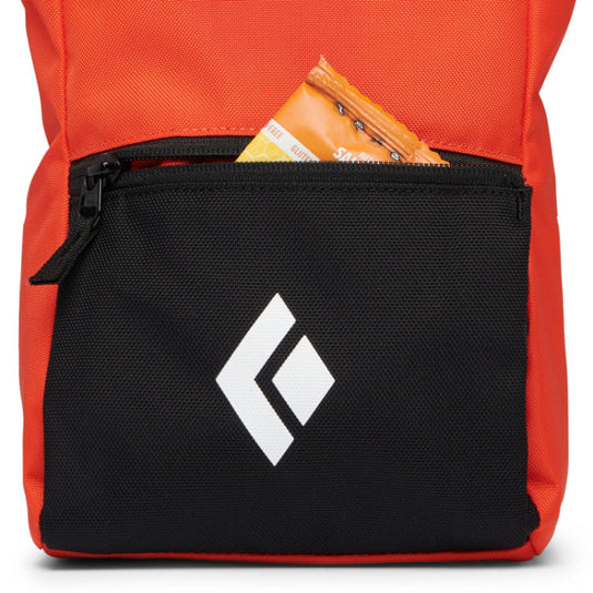 Close up of Black Diamond Team Chalk Pot displaying a snack in front pocket