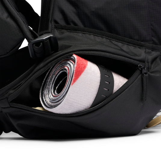 Black Diamond Dawn Patrol 25 Backpack in foam green showing zippered hip belt pockets