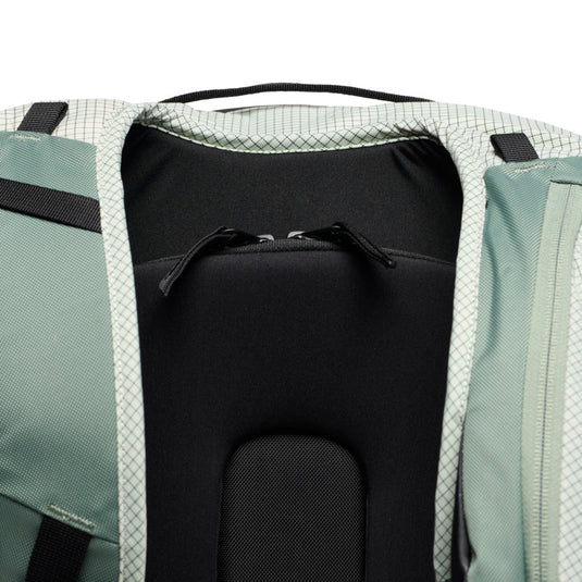 Black Diamond Dawn Patrol 25 Backpack in foam green showing zippered back panel access