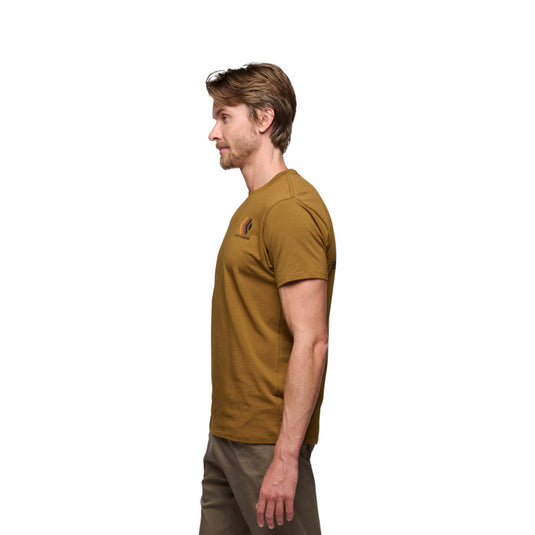 Black Diamond Faded Tee in Dark Curry - side view - worn by model walking past