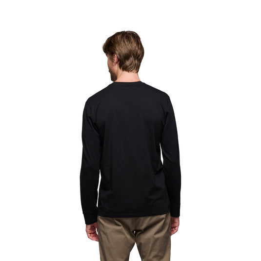 Men's Heritage Wordmark Long Sleeve Tee - in black worn by model facing away