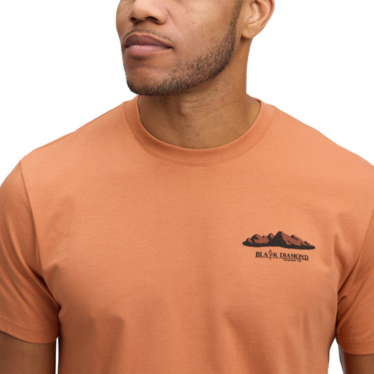 Black Diamond Mens Mountainscape Short Sleeve Tee in Moab Brown - worn by model- close up of mountain graphic and BD logo