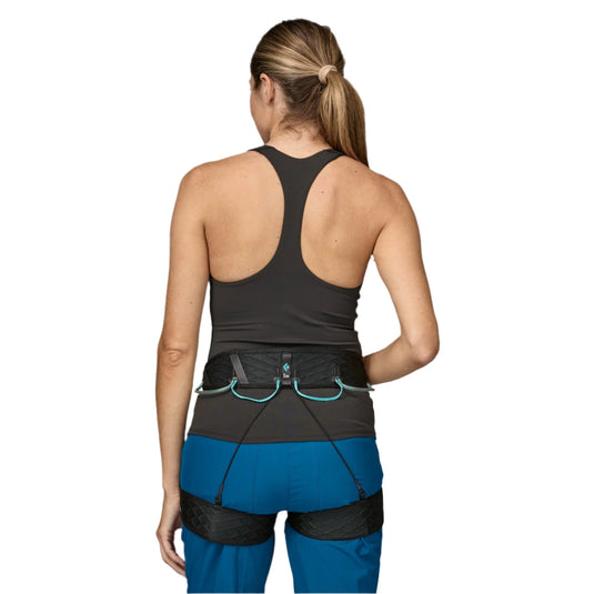 Women's Maipo Tank Top in black worn by model facing away wearing a harness