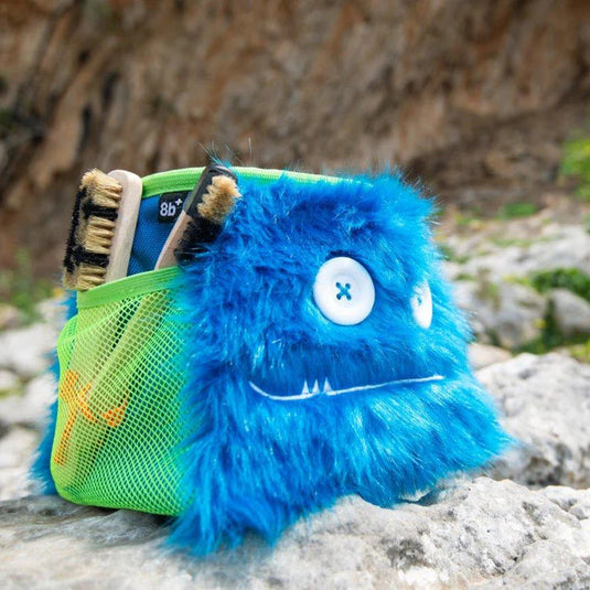 8B+ maxwell Chalk Bucket in blue fur design outside with chalk brushes in holders