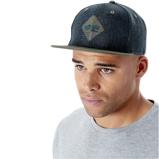 RAB Flatiron Badge Cap in PINE worn by model