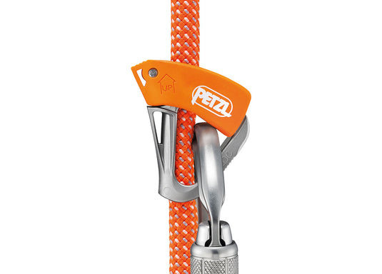 Petzl Tibloc Ascender in Orange and steel gray in use againts orange rope with grey carabiner attached
