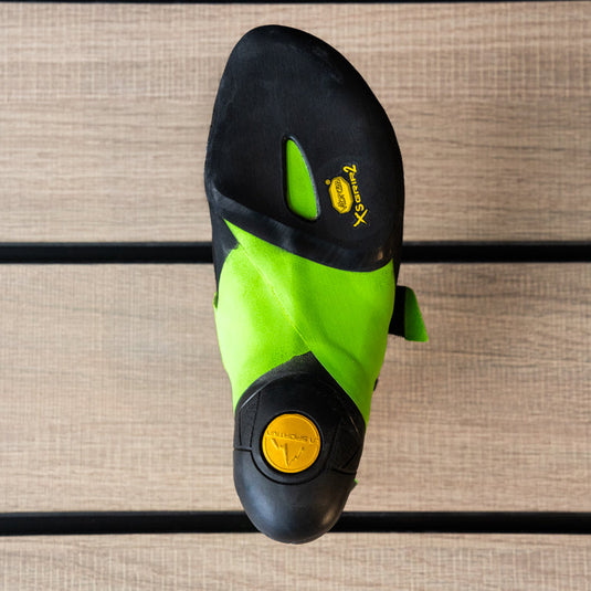The sole of a climbing shoe, La Sportiva Skwama vegan, showing Vibram rubber logo