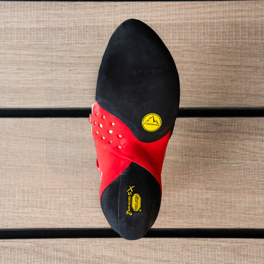The sole of a climbing shoe, La Sportiva Solution comp womens, showing Vibram rubber logo