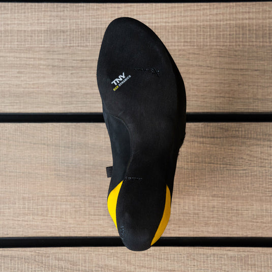 The sole of a climbing shoe, Tenaya Iati, showing Vibram rubber logo