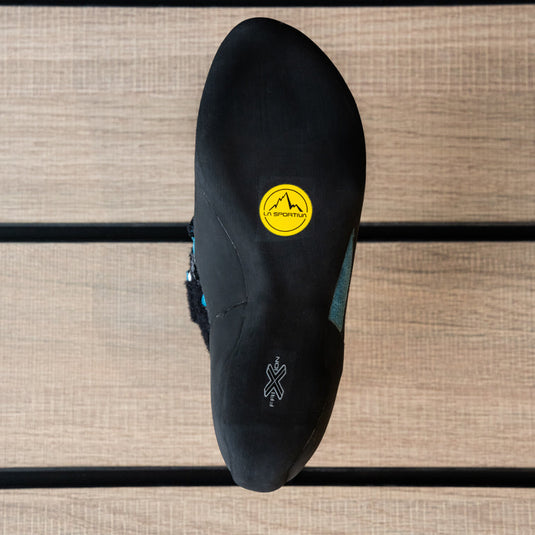 The sole of a climbing shoe, La Sportiva Tarantula womens showing Vibram rubber logo