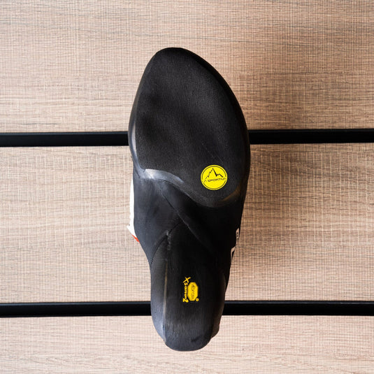 The sole of a climbing shoe, La Sportiva Genius, showing Vibram rubber logo