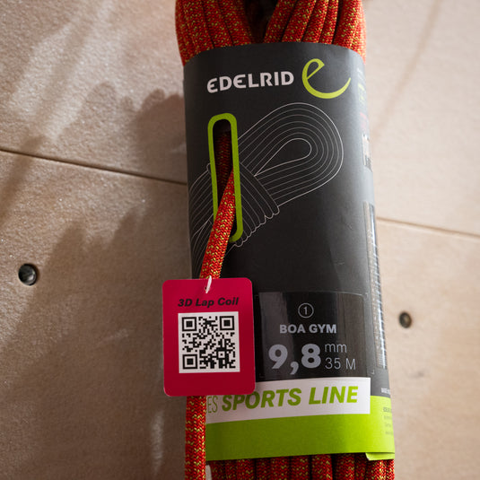 Red Edelrid BOA 9.8mm rope, coiled in black and green packaging