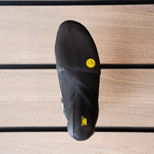 The sole of a climbing shoe, La Sportiva Mantra, showing Vibram rubber logo