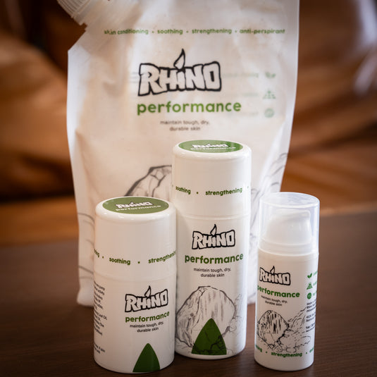 Four containers of Rhino Skin Performance - maintain tough, dry durable skin of varied sizes. One large refill pouch and three smaller bottles.