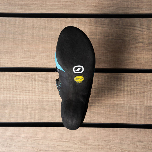 The sole of a Scarpa Force climbing shoe, showing Vibram rubber logo