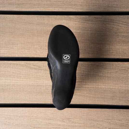 The sole of a climbing shoe, Scarpa Reflex VS, showing Vision rubber logo in the centre