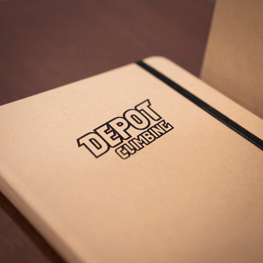 A5 Depot Climbing Note Book on wooden surface