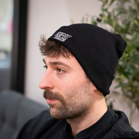 Depot Beanie in black worn by model