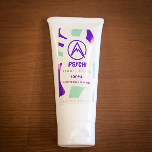 Front profile of Psychi Liquid chalk 100ml tube with purple and green design.