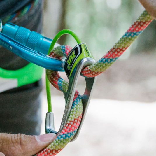 Edelrid Jul 2 belay device with blue Bulletproof Eco carabiner attached in use with multi-coloured rope attached