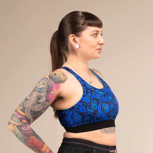 3rd Rock Equinox Sports Bra in Geo Jaguar design, worn by model
