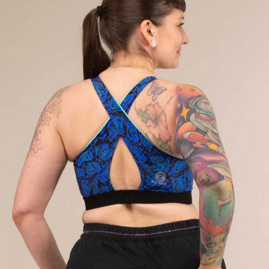 3rd Rock Equinox Sports Bra in Geo Jaguar design, worn by model facing away