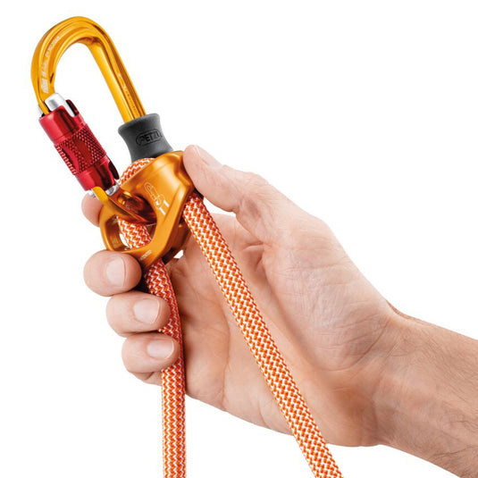 Close up image of the Petzl Connect Adjust lanyard 2025 with carabiner inserted in the connector and rubber band placed on carabiner.