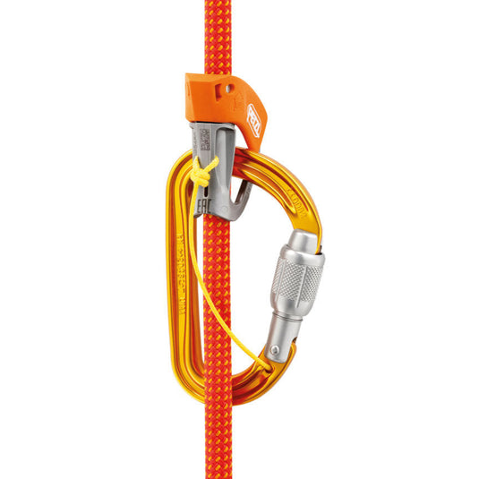 Petzl Sm'D Carabiner with Petzl Tibloc Device attached with orange rope threaded through device and carabiner