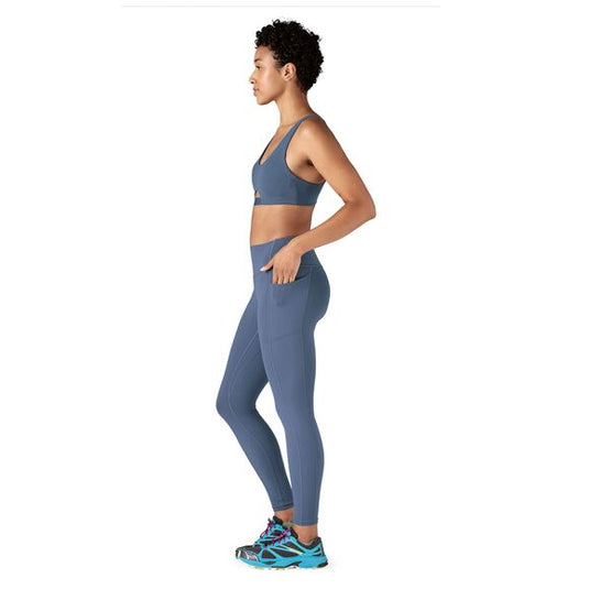 Patagonia Womens Maipo Low Impact Adjustable Bra in utility blue worn by model turned to side
