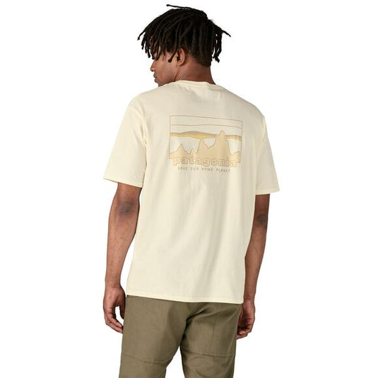 Patagonia Mens '73 Skyline Organic T-Shirt in Birch White with large patagonia logo worn by model facing away