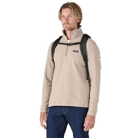 Man weaing Patagonia Refugio Day Pack 30L from front with sternum strap visual