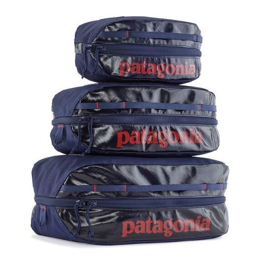 Patagonia Black Hole Cube in 3L, 6L & 14L stacked on top of one another for size comparison.