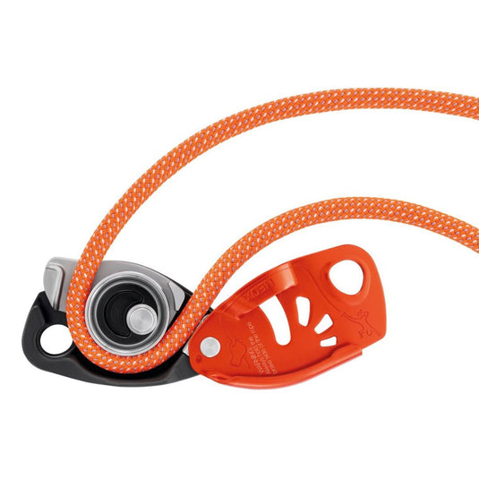 Petzl Neox Belay Device in Orange Open to see intergrated wheel with orange rope thread through device
