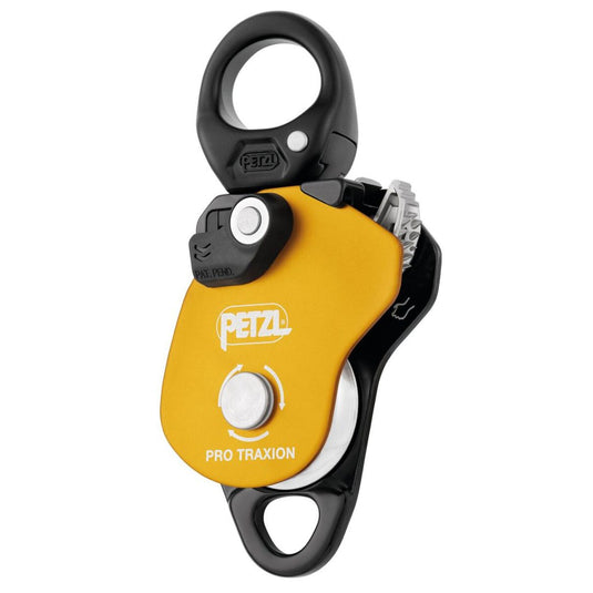 Petzl Pro Traxion: a yellow and black mechanical pulley designed for efficient hauling and lifting in climbing or rescue operations.