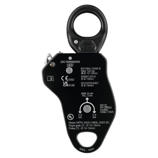 The rear of Petzl Pro Traxion showing varied safety information and policy numbers in white text