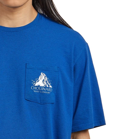 Patagonia Mens Chouinard Crest Pocket Responsibili-Tee® In Endless Blue close up of small mountain design on pocket worn by model