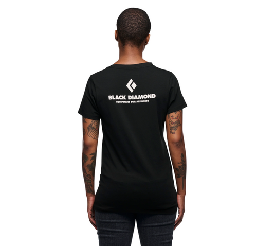 Black Diamond Women's Equipment for Alpinists Tee in black worn by model facing away