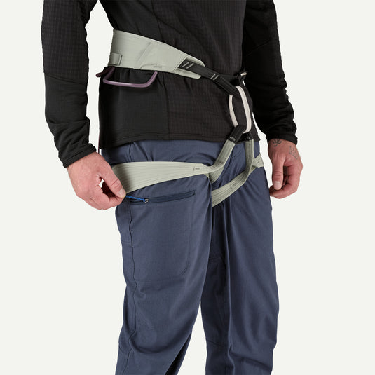 Patagonia Mens Venga Rock Pants in Smoulder Blue worn by model in harness