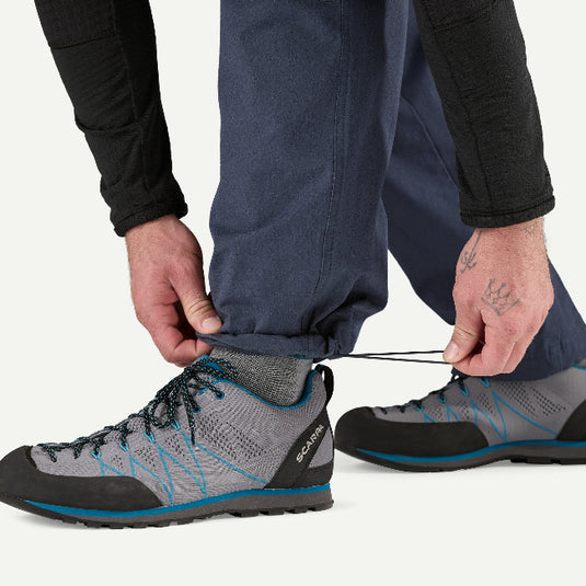 Patagonia Mens Venga Rock Pants in Smoulder Blue - worn by model showing elasticated leg cuffs