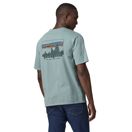 Patagonia Mens '73 Skyline Organic T-Shirt in Thermal Blue with large patagonia logo worn by model facing away