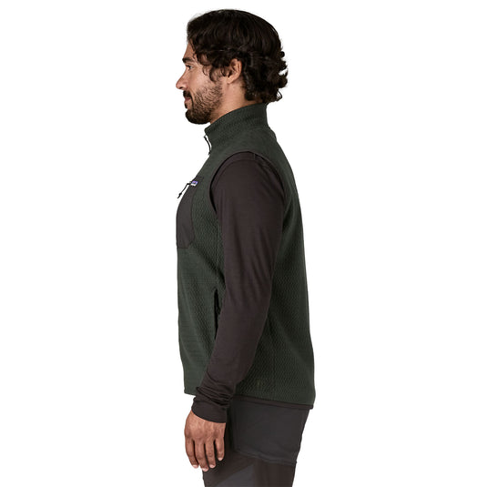 Patagonia Mens R1 Air Vest in Old Growth Green worn by model facing the side
