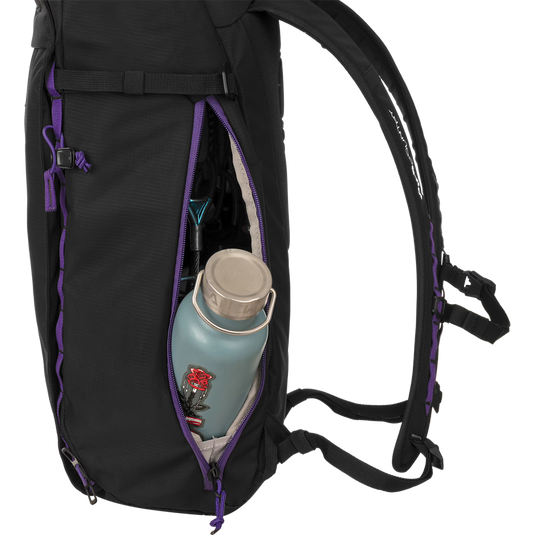 Wild Country Progress Backpack 25L - in black with purple features showing water bottle in side pocket
