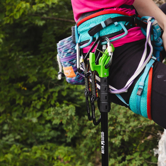 Beta evo clipstick clipped to harness of climber on route outside