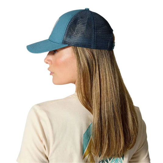 Rab Dihedral Badge Cap worn by model turned to side