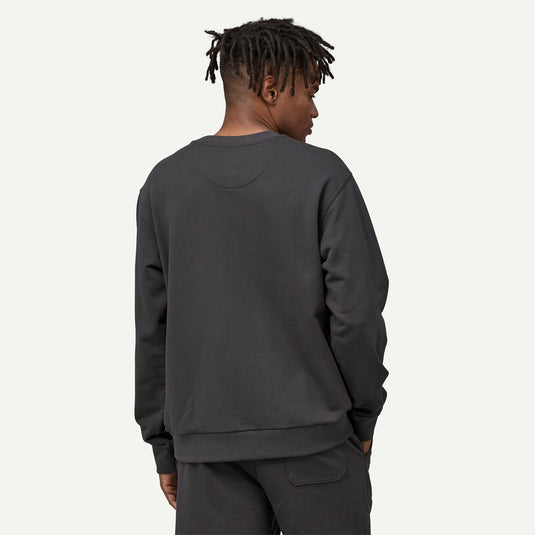 Patagonia daily crew neck sweatshirt in ink black worn by model