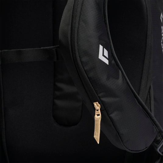 Black Diamond Dawn Patrol 25 Backpack in foam green showing zippered shoulder pockets