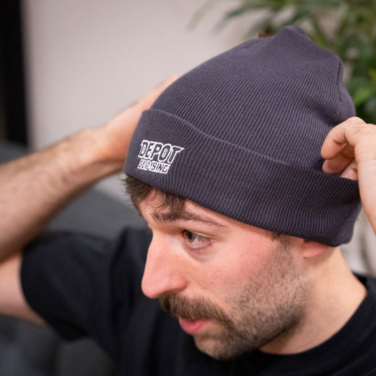 Depot Beanie in granite worn by model 