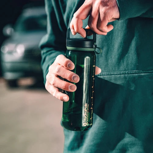 RECON Clip & Carry water bottle being held